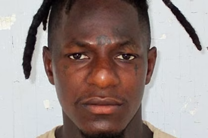 Kentucky high court throws out murder convictions for man serving life in killings of a father and his young daughter