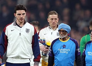 Heartwarming moment England and Wales footballers walk out with 22 mascots with dementia in emotional scenes before Wembley showdown