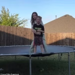 Incredible moment hero sister jumps into action to help save brother from choking