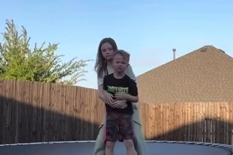 Incredible moment hero sister jumps into action to help save brother from choking