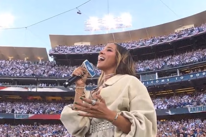 Baseball fans go wild for the ‘most beautiful woman on the planet’ singing national anthem at the World Series