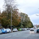 Stranger jumps in woman's car and stabs man in back seat in 'horror movie' attack