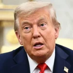 Arrest threat: Illinois governor dares Trump