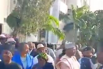 INEC Staff Bid Ex-Chairman Mahmood Yakubu ‘Funeral-Style’ Farewell [WATCH]
