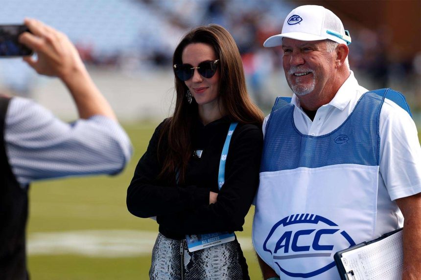 Jordon Hudson Poses for Photos on Sidelines at Bill Belichick’s UNC Game