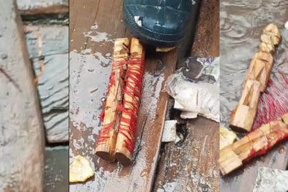 Drama As Lady Unties Wooden Images Bound Together With Red Rope, Reveals Names Written On Them