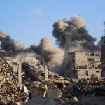 Gaza latest: Israel carries out fresh strikes and suspends aid into Gaza