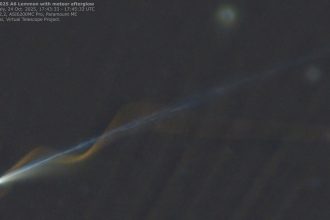 ‘Miracle’ photo captures Comet Lemmon and meteor seemingly entwined over Earth