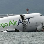 At Least 2 Dead After Plane Slides Off Runway, Crashes into Car, Plummets in Ocean