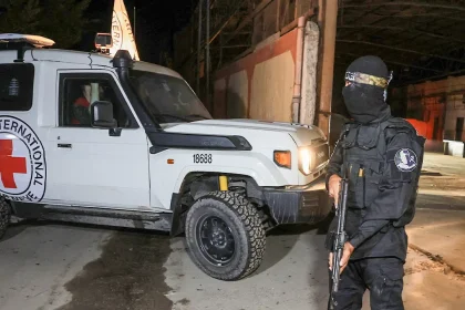 Red Cross retrieves 2 coffins of deceased hostages, headed to IDF troops