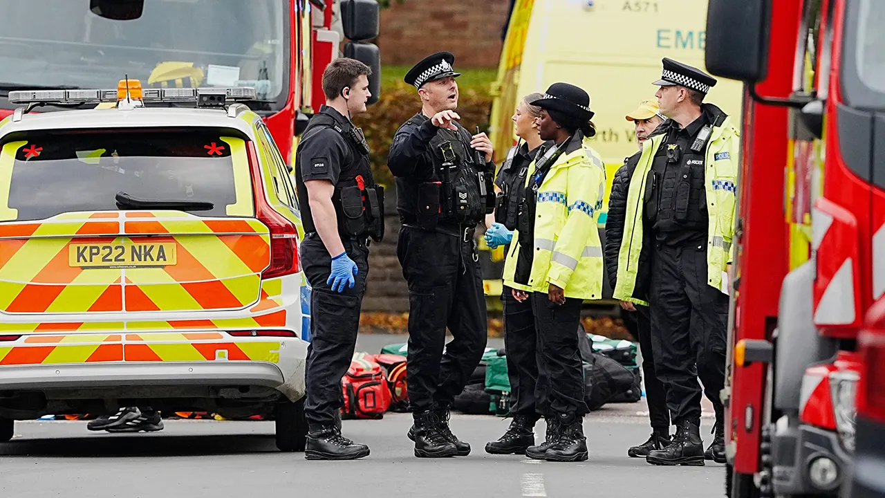 Four injured in car and knife attack outside UK synagogue; suspect shot