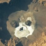 Glowering ‘skull’ stares upward from a giant volcanic pit in the Sahara — Earth from space