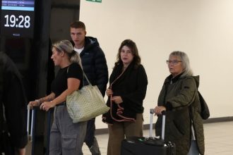 Pregnant Bella Culley pictured landing in UK as 'drug mule' released from Georgia jail