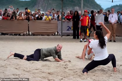 It’s beached Wales! Prince William has a ball on Rio’s Copacabana as he goes barefoot for a sunset game of volleyball – after playing football at the iconic Maracanã stadium ahead of his Earthshot events in Brazil