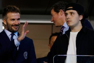 Brooklyn Beckham’s brutal reaction after his dad David is finally knighted