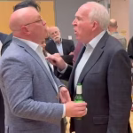 Ex-CIA chief John Brennan jabs activist in the chest after being confronted over Hunter Biden laptop claim