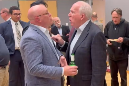 Ex-CIA chief John Brennan jabs activist in the chest after being confronted over Hunter Biden laptop claim