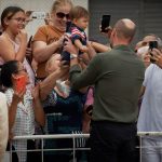 Prince William wins hearts as he cuddles baby handed to him on Brazilian island | World News