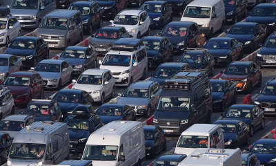 Passengers face Christmas travel chaos amid ferry queues and train cancellations