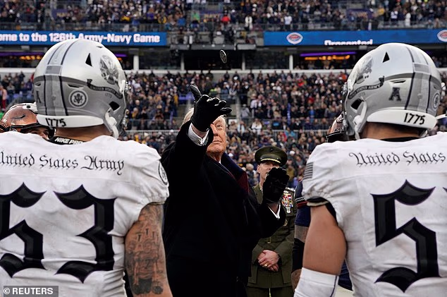Awkward moment Trump butchers bizarre coin toss ahead of Army-Navy showdown: ‘Worst in the history of football’