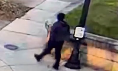 Masked suspect is seen fleeing Brown University as students remain in lockdown after rampage that left two dead