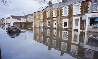 Flood and ‘do not travel’ alerts issued after half a month’s rain falls in just 24 hours – with more yellow and amber warnings in place