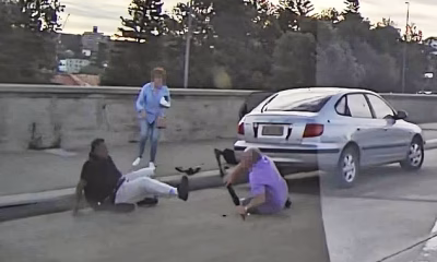 Brave moment Bondi beachgoers walking past gunmen’s car try to disarm the evil terrorist before he started shooting – and lost their lives in the struggle