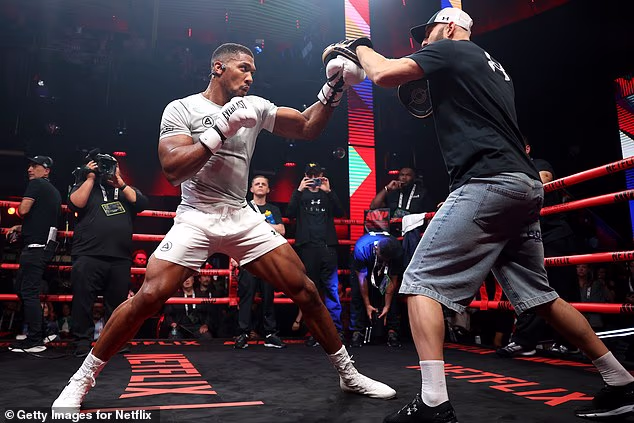 Anthony Joshua warns Jake Paul ‘if I can kill you, I will’ ahead of megafight – as underdog vows to ‘shock the world’
