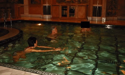 Bill Clinton swims with mystery woman and poses with Kevin Spacey and Michael Jackson as long-awaited files are finally released by DOJ