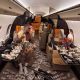 Worth the jaw break, Jake? Battle-scarred Paul flaunts £140m purse after knockout defeat to Anthony Joshua – posing with wads of cash and SIX guns on a private jet