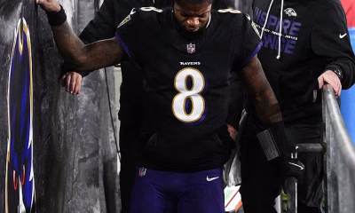 Ravens star Lamar Jackson sidelined with brutal back injury in crucial win-or-else game against Patriots