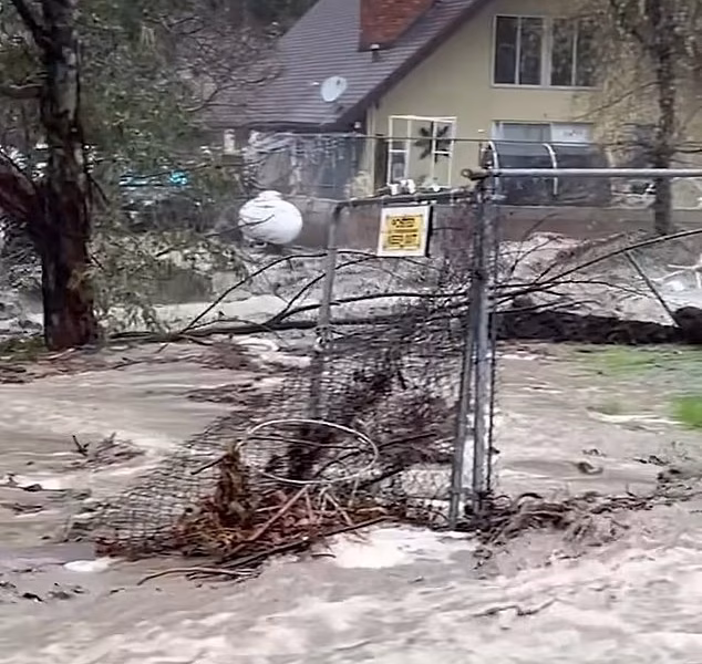 California braces for SECOND life-threatening wave of flash floods as homes are engulfed in mud sludge and 160,000 left in dark on Christmas Day