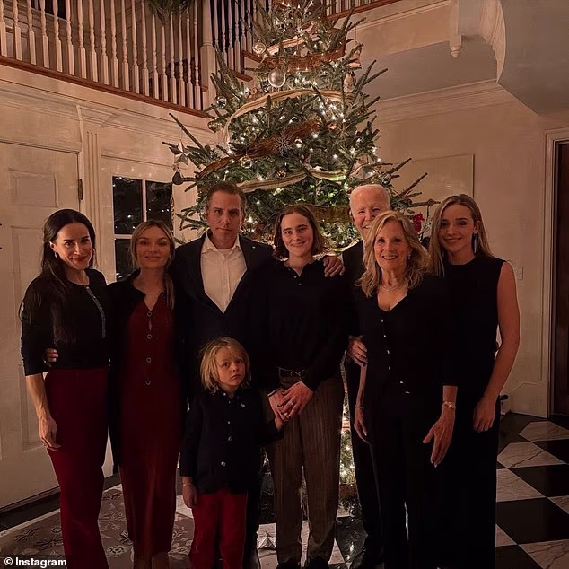 Joe Biden posts confusing Christmas card of his whole family…but fans say they can BARELY see him