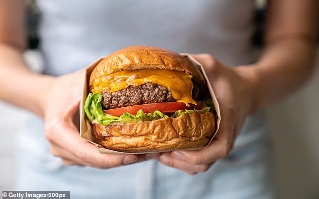 Eat a burger a week to help save the planet, scientists say in ‘vegan-annoying announcement’- because ‘some meat is environmentally good’