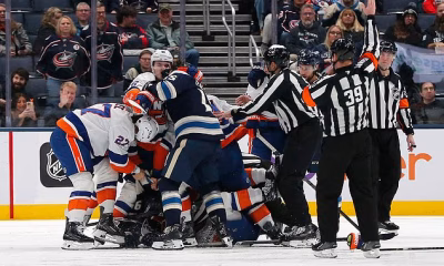 Hockey star attacks rival with his STICK and sparks huge brawl in wild midgame meltdown