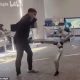 Ouch! Watch the eye-watering moment a man is kicked in the GROIN by a robot mimicking his movements