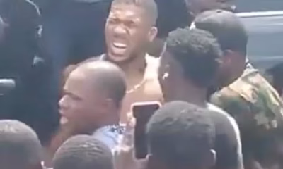 Anthony Joshua ‘is stable’, officials confirm after he was pulled from crumpled wreckage of car crash in Nigeria that killed two ‘foreign nationals’ in the same vehicle as him