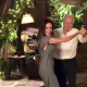Heartwarming moment Victoria Beckham dances with her rarely-seen dad Tony Adams during Christmas celebrations without son Brooklyn