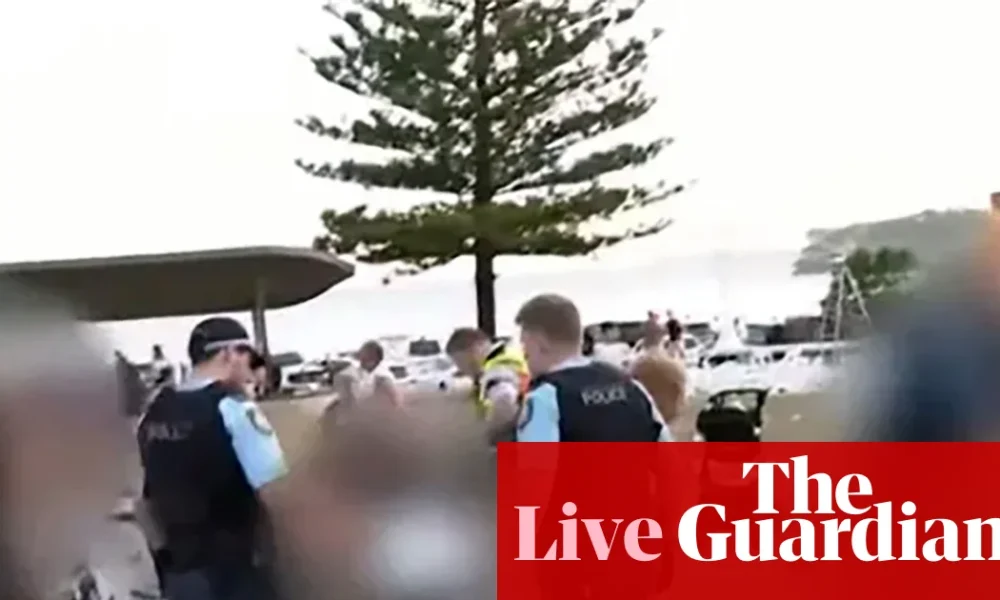 Bondi beach shooting live updates: two people in custody as PM urges public to follow police guidance amid ‘shocking and distressing’ scenes | New South Wales