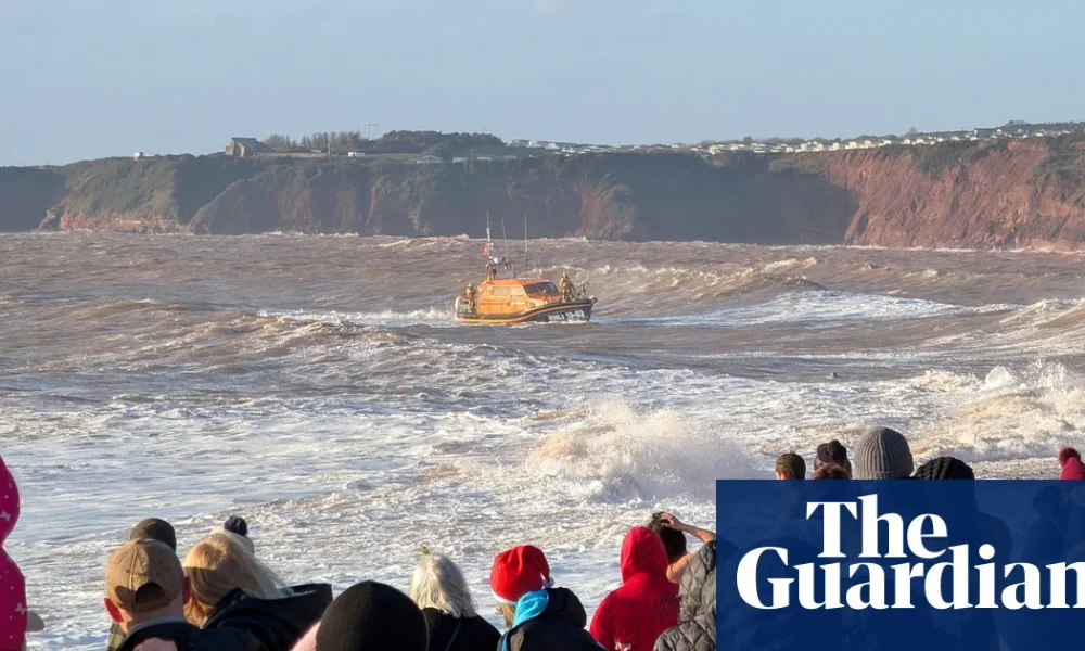 Two men feared missing in sea off Devon beach on Christmas Day | UK news