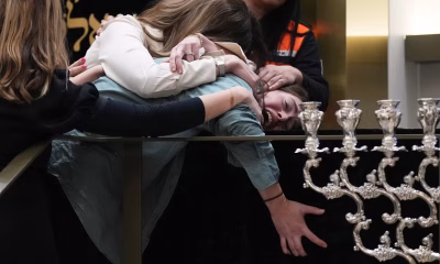 Bondi Beach suspect charged with 15 counts of murder as first funerals take place in Sydney