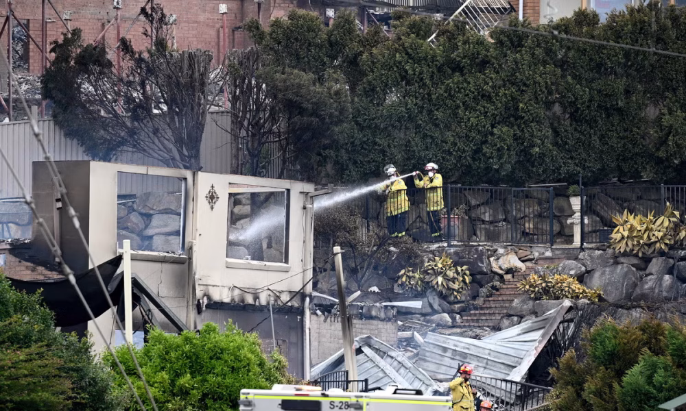 Firefighter killed as out-of-control bushfires destroy homes in Australia