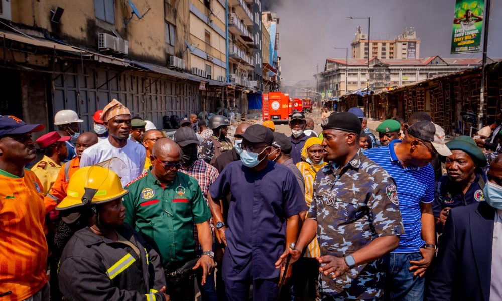 Gov Sanwo-Olu visits scene of Balogun market fire incident
