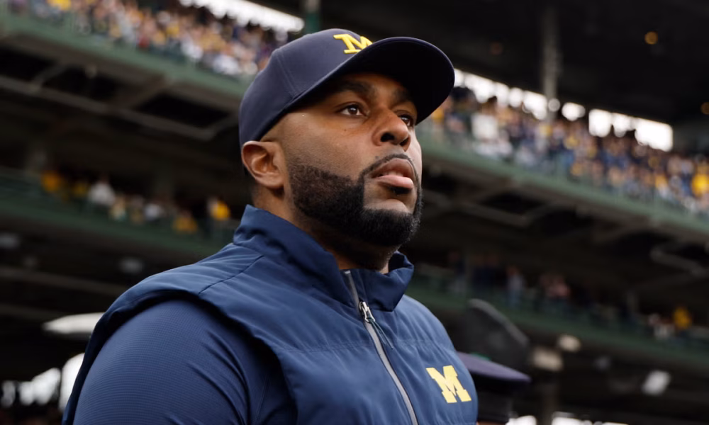Fired Michigan football coach Sherrone Moore charged with home invasion and stalking