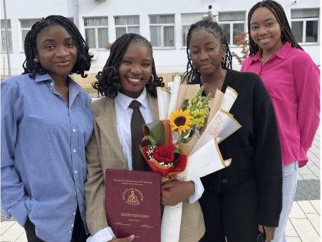 Two Nigerian Female Students Distinguish Selves In Foreign University