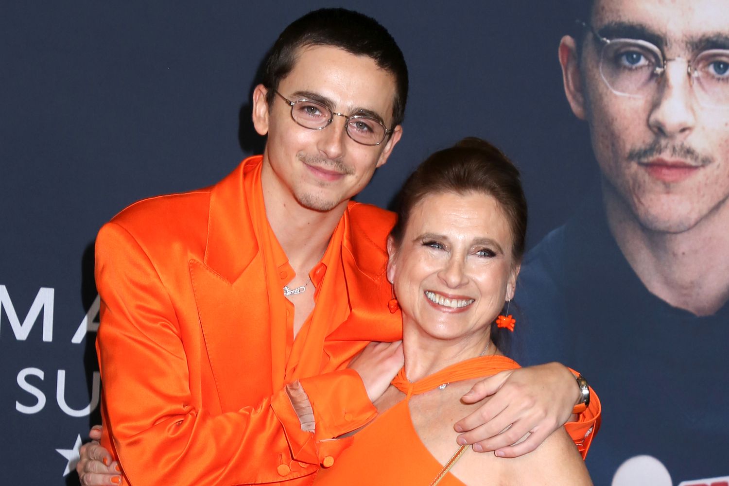 Timothée Chalamet Twins with His Mom in Orange at ‘Marty Supreme’ Premiere