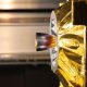 Golden satellite insulation sparkles during test photo of the day for Dec. 30, 2025