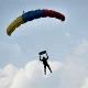Skydiver’s reserve chute mistakenly deploys, leaving him dangling from plane