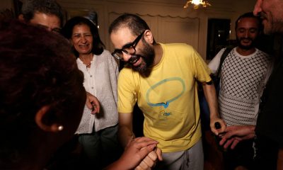 British-Egyptian activist Alaa Abd El-Fattah returns to the UK and reunites with family after prison release | UK News